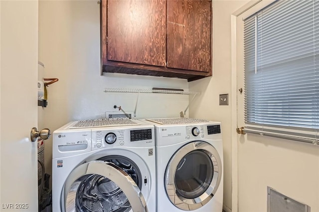 laundry area featuring cabinet space and washing machine and dryer