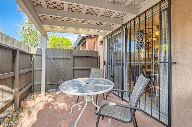 view of patio / terrace featuring fence