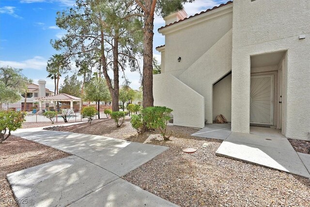 7901 Idledale Ct Unit 102, Las Vegas, NV 89145 - view of yard featuring fence
