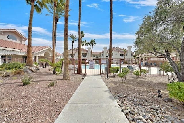 7901 Idledale Ct Unit 102, Las Vegas, NV 89145 - surrounding community with fence, a pool, and a residential view