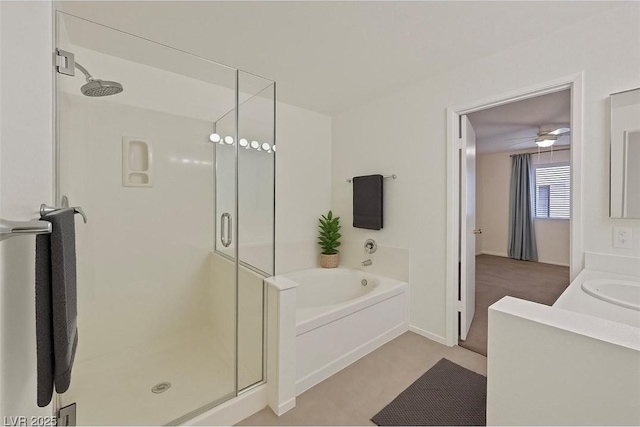 7901 Idledale Ct Unit 102, Las Vegas, NV 89145 - full bathroom featuring a shower stall, a garden tub, and vanity