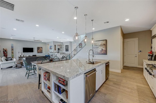 10840 Rosin Jaw St, Las Vegas, NV 89183 - kitchen with a sink, visible vents, appliances with stainless steel finishes, and open shelves