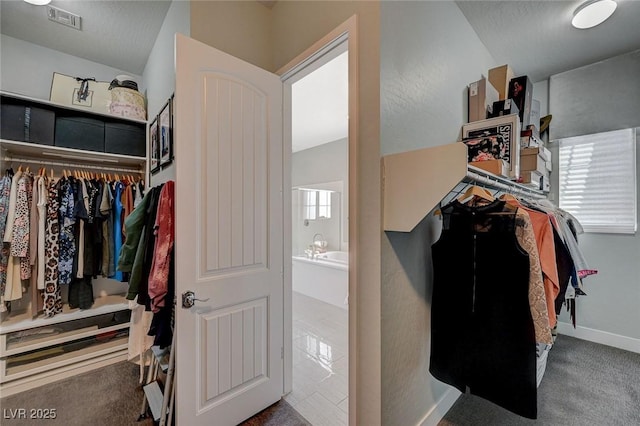 10840 Rosin Jaw St, Las Vegas, NV 89183 - walk in closet featuring visible vents and carpet floors