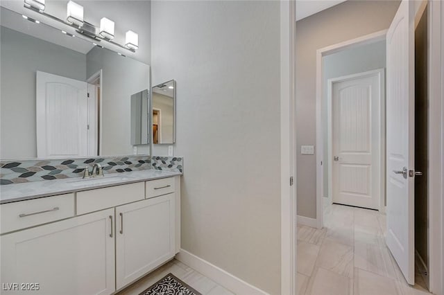 10840 Rosin Jaw St, Las Vegas, NV 89183 - bathroom with vanity and baseboards