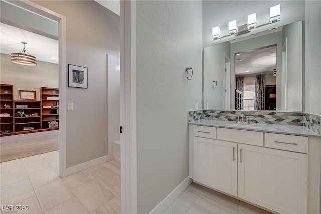 10840 Rosin Jaw St, Las Vegas, NV 89183 - bathroom with vanity and baseboards