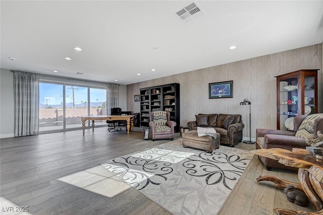 10840 Rosin Jaw St, Las Vegas, NV 89183 - living area featuring recessed lighting, visible vents, baseboards, and wood finished floors