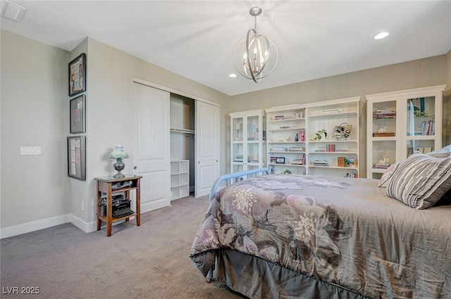 10840 Rosin Jaw St, Las Vegas, NV 89183 - bedroom featuring visible vents, baseboards, a closet, a chandelier, and light colored carpet