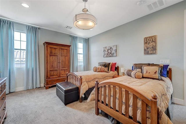 10840 Rosin Jaw St, Las Vegas, NV 89183 - bedroom with light carpet, baseboards, and visible vents