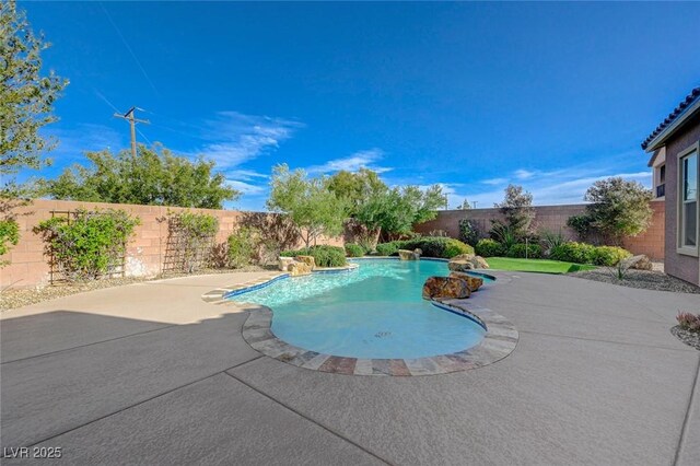 10840 Rosin Jaw St, Las Vegas, NV 89183 - view of swimming pool with a patio, a fenced backyard, and a fenced in pool