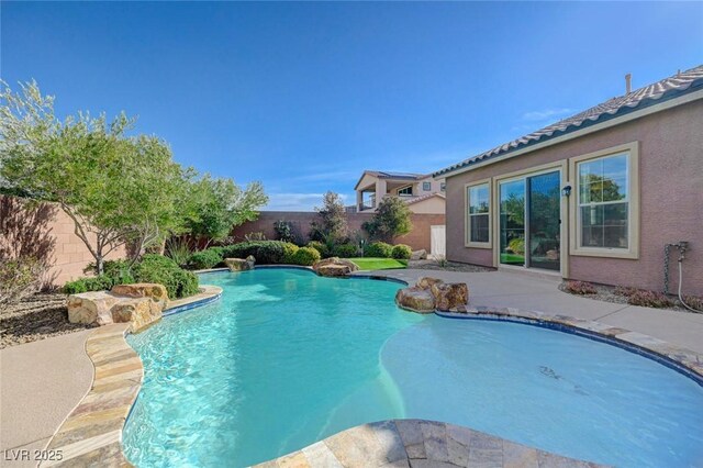 10840 Rosin Jaw St, Las Vegas, NV 89183 - view of swimming pool with a fenced in pool, a patio area, and a fenced backyard