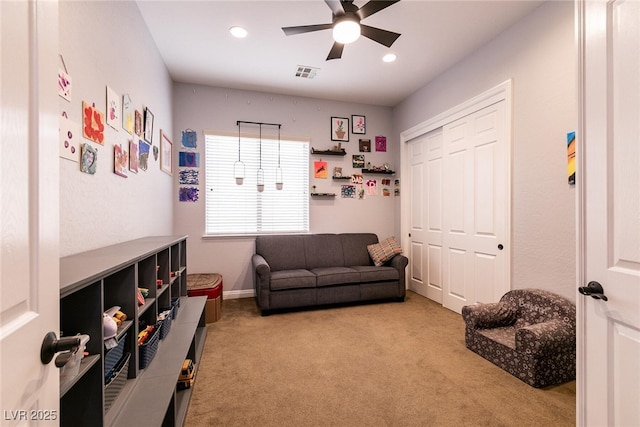 7416 Redhead Dr, North Las Vegas, NV 89084 - living area featuring a ceiling fan, carpet floors, and recessed lighting