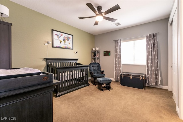 7416 Redhead Dr, North Las Vegas, NV 89084 - bedroom featuring light carpet and a ceiling fan