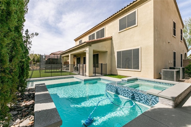 7416 Redhead Dr, North Las Vegas, NV 89084 - view of swimming pool featuring a pool with connected hot tub and cooling unit