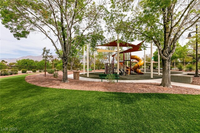 7416 Redhead Dr, North Las Vegas, NV 89084 - community play area featuring a yard and a mountain view