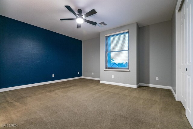 7416 Redhead Dr, North Las Vegas, NV 89084 - unfurnished bedroom with carpet floors, a closet, and ceiling fan