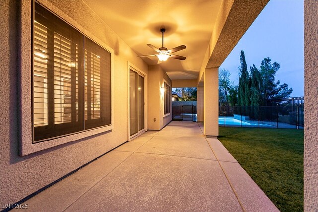 7416 Redhead Dr, North Las Vegas, NV 89084 - fenced backyard featuring a patio and ceiling fan