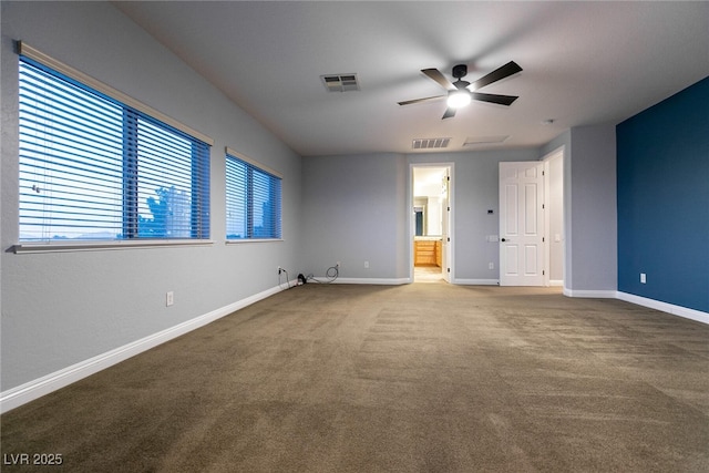 7416 Redhead Dr, North Las Vegas, NV 89084 - unfurnished bedroom with carpet flooring, ensuite bath, and ceiling fan