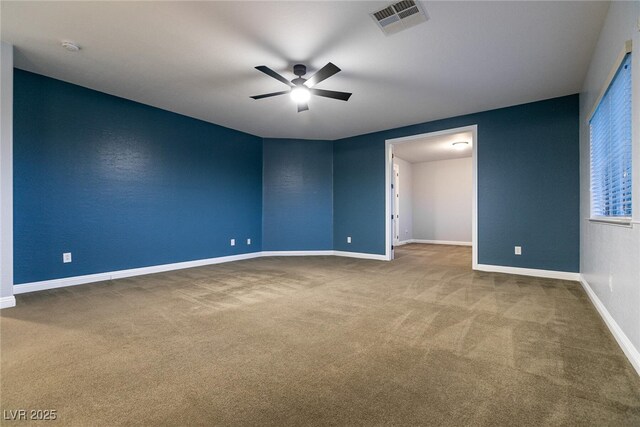 7416 Redhead Dr, North Las Vegas, NV 89084 - carpeted spare room featuring ceiling fan and a smoke detector