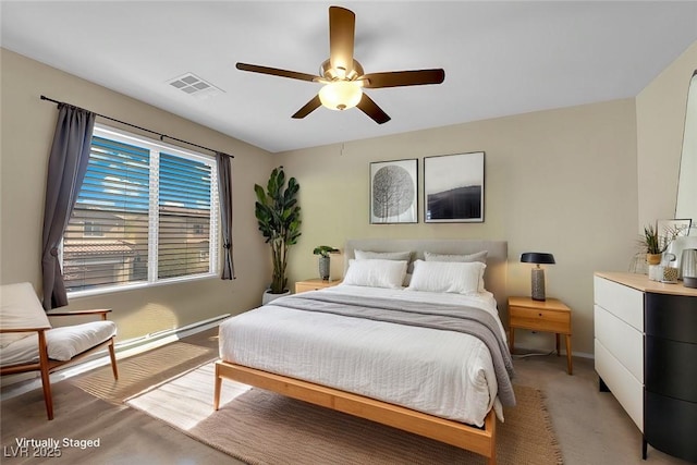bedroom featuring baseboards, visible vents, and a ceiling fan
