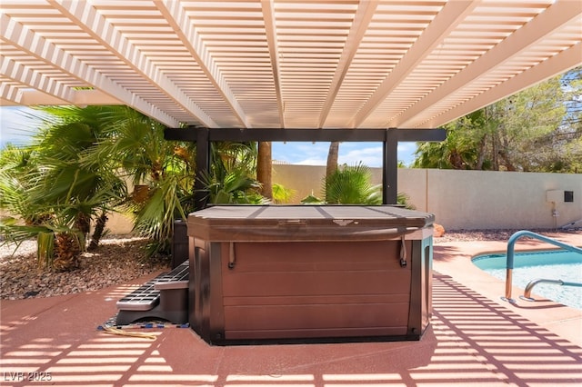 5217 Cold River Ave, Las Vegas, NV 89130 - view of patio / terrace with a hot tub