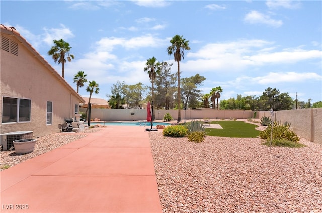 5217 Cold River Ave, Las Vegas, NV 89130 - fenced backyard with a patio