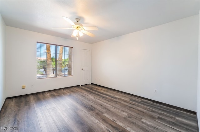 5217 Cold River Ave, Las Vegas, NV 89130 - empty room with dark wood-style flooring and a ceiling fan