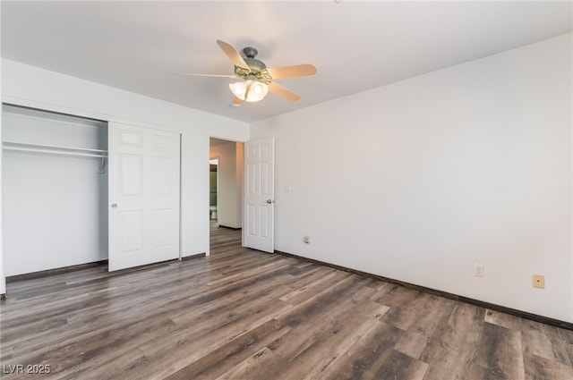 5217 Cold River Ave, Las Vegas, NV 89130 - unfurnished bedroom featuring wood finished floors, a closet, and a ceiling fan