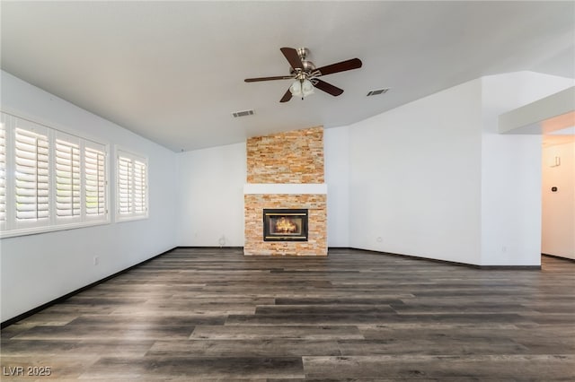 5217 Cold River Ave, Las Vegas, NV 89130 - unfurnished living room featuring lofted ceiling, a ceiling fan, wood finished floors, and a fireplace