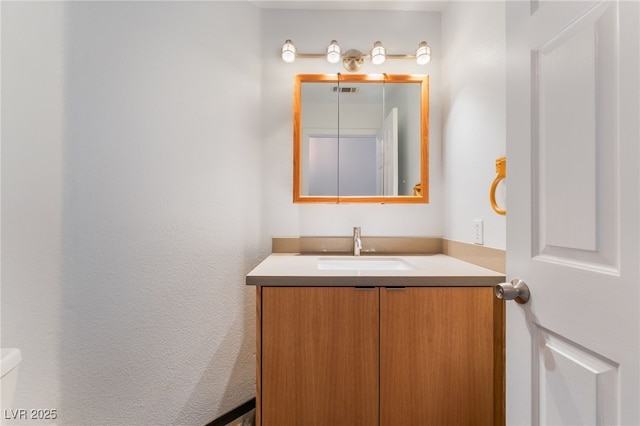 5217 Cold River Ave, Las Vegas, NV 89130 - bathroom with vanity and toilet