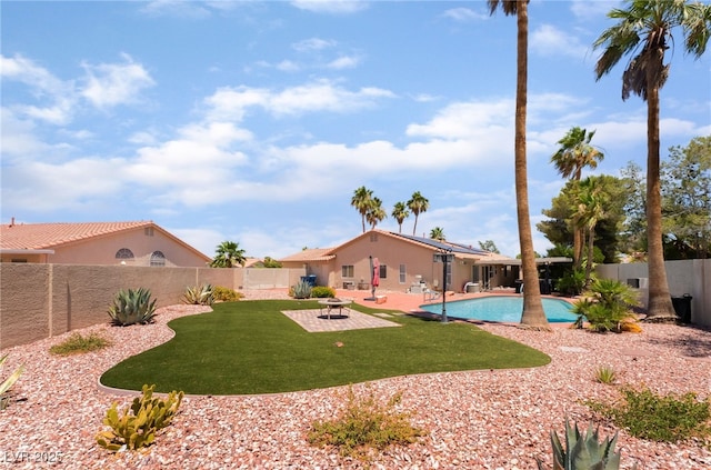 5217 Cold River Ave, Las Vegas, NV 89130 - fenced backyard with a patio