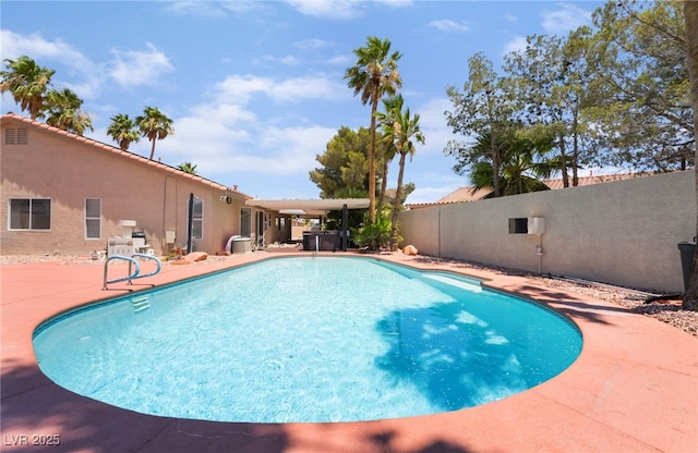 5217 Cold River Ave, Las Vegas, NV 89130 - view of swimming pool with a fenced backyard and a patio