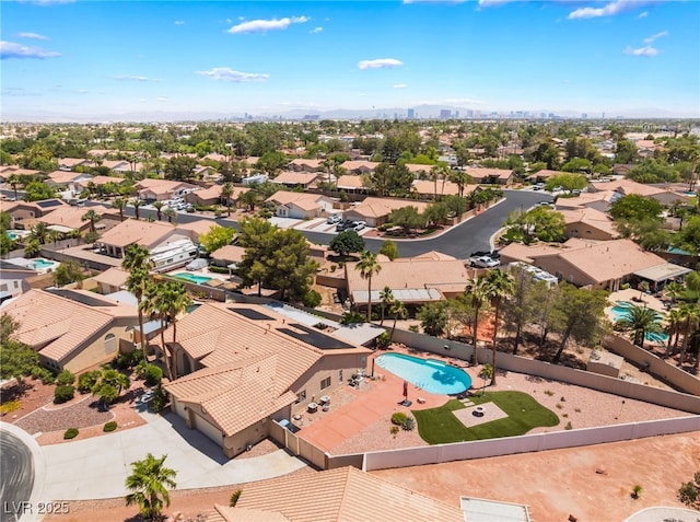 5217 Cold River Ave, Las Vegas, NV 89130 - aerial perspective of suburban area featuring a pool area