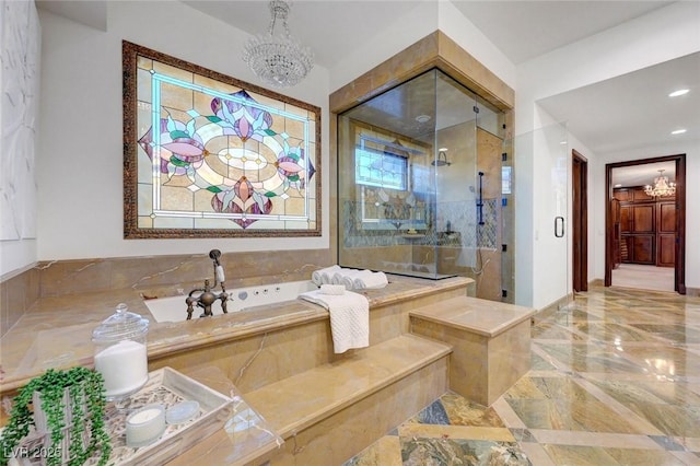 15 Rue Du Rivoli Pl, Henderson, NV 89011 - full bath featuring a stall shower, a garden tub, marble tiled flooring, a chandelier, and recessed lighting