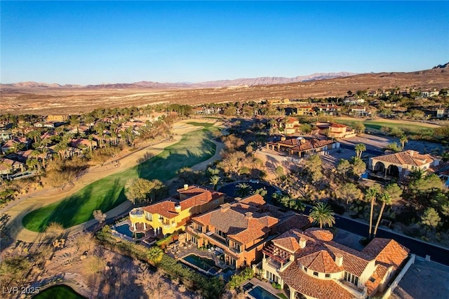 15 Rue Du Rivoli Pl, Henderson, NV 89011 - aerial overview of property's location with nearby suburban area and a mountain backdrop