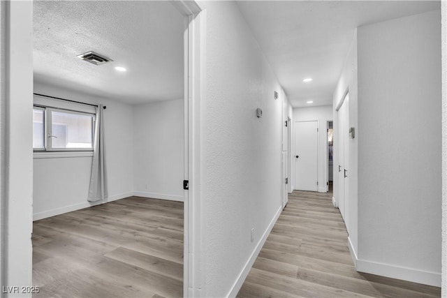 2204 Monterey Ave, Las Vegas, NV 89104 - corridor with wood finished floors, recessed lighting, and baseboards