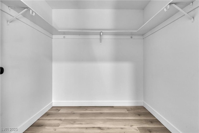 2204 Monterey Ave, Las Vegas, NV 89104 - spacious closet with wood finished floors