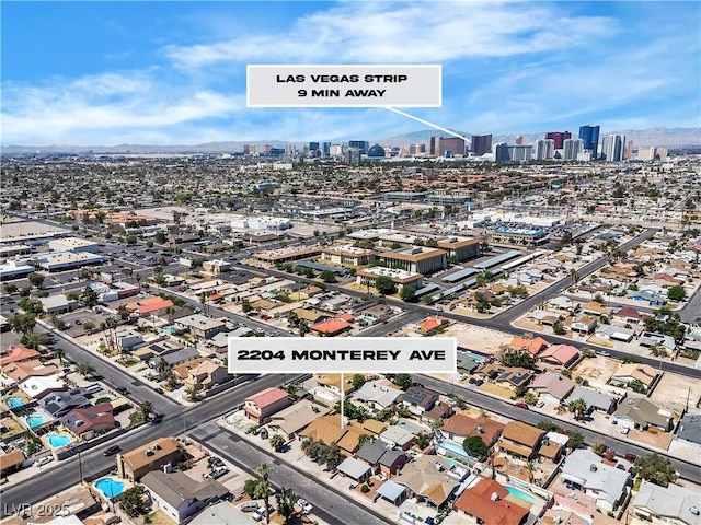 2204 Monterey Ave, Las Vegas, NV 89104 - aerial overview of property's location with a view of skyline