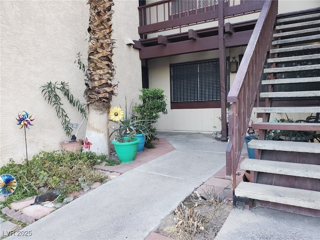 3168 S Eastern Ave Unit 45, Las Vegas, NV 89169 - property entrance with stucco siding and a balcony