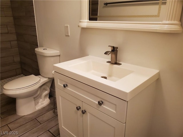 3168 S Eastern Ave Unit 45, Las Vegas, NV 89169 - bathroom with vanity, toilet, and tiled shower