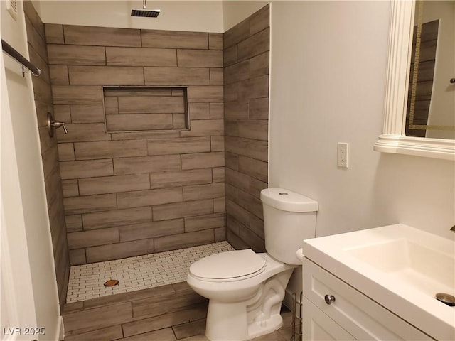 3168 S Eastern Ave Unit 45, Las Vegas, NV 89169 - bathroom with vanity, toilet, and tiled shower
