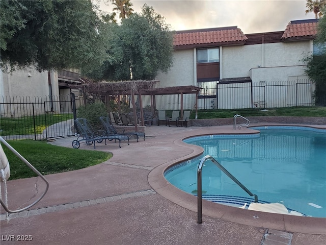 3168 S Eastern Ave Unit 45, Las Vegas, NV 89169 - community pool featuring a pergola, a patio, and fence