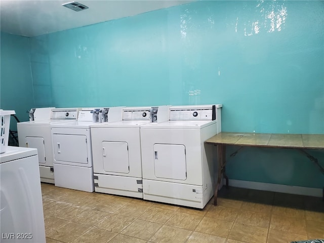 3168 S Eastern Ave Unit 45, Las Vegas, NV 89169 - shared laundry featuring washing machine and clothes dryer