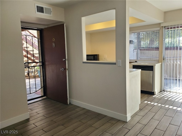 3168 S Eastern Ave Unit 45, Las Vegas, NV 89169 - foyer with baseboards and wood finish floors