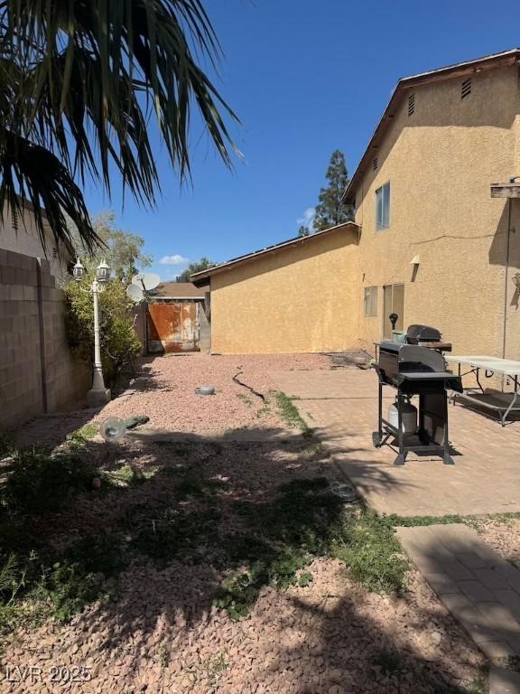 6801 Atwood Ave, Las Vegas, NV 89108 - view of yard with fence and a patio