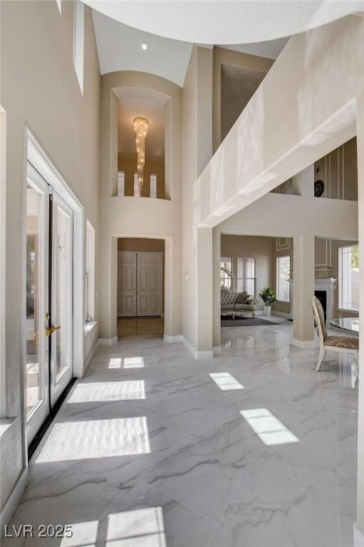 10550 Patrington Ct, Las Vegas, NV 89183 - entryway with baseboards, french doors, a high ceiling, and marble finish floor