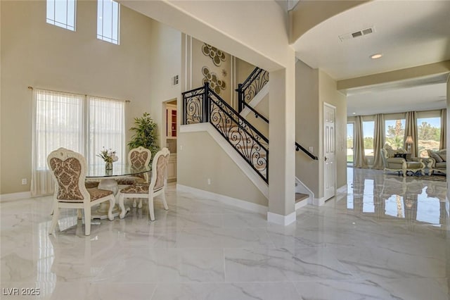10550 Patrington Ct, Las Vegas, NV 89183 - dining room featuring visible vents, baseboards, and marble finish floor