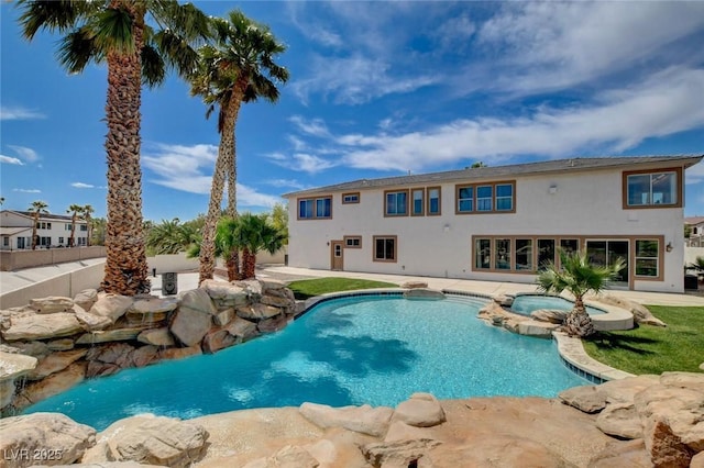 10550 Patrington Ct, Las Vegas, NV 89183 - view of pool with a pool with connected hot tub and a patio