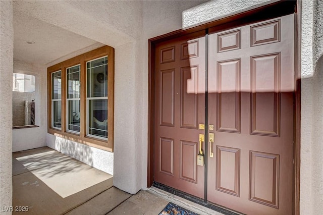 10550 Patrington Ct, Las Vegas, NV 89183 - view of exterior entry with stucco siding and covered porch