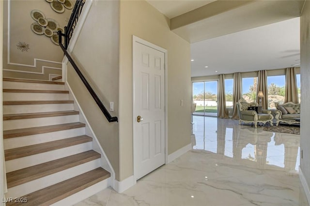 10550 Patrington Ct, Las Vegas, NV 89183 - staircase with baseboards and marble finish floor