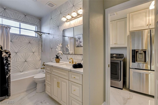 10550 Patrington Ct, Las Vegas, NV 89183 - full bath featuring visible vents, marble finish floor, shower / tub combo with curtain, washer / clothes dryer, and vanity